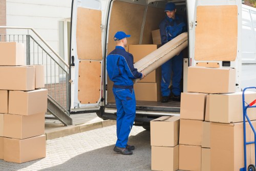 Removal team preparing a same day move in a Wandsworth residential street