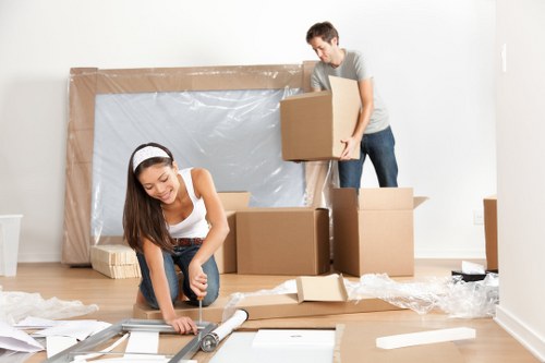 Office removals planning in Wandsworth with moving boxes and workspace setup
