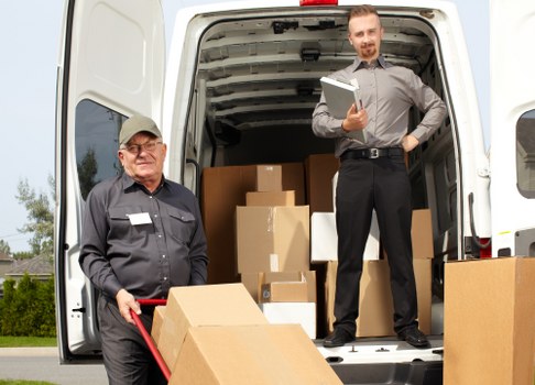 Man and van service in Wandsworth loading moving boxes