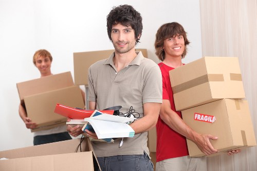 Carefully packed boxes and labelled supplies for a home move in Wandsworth