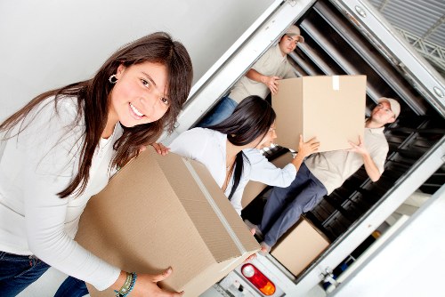 Moving van loading household belongings for flat removals in Wandsworth