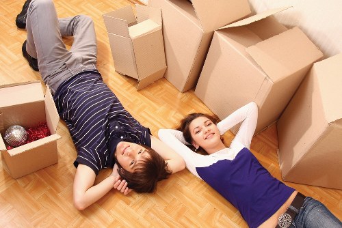Professional movers handling furniture in a Wandsworth property
