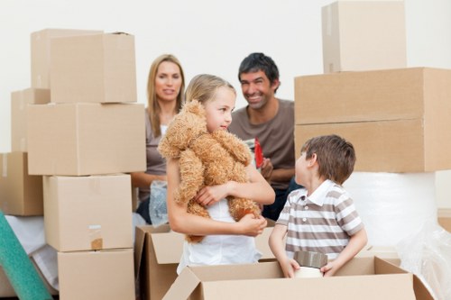 Local moving team handling furniture removals in Wandsworth on a residential street